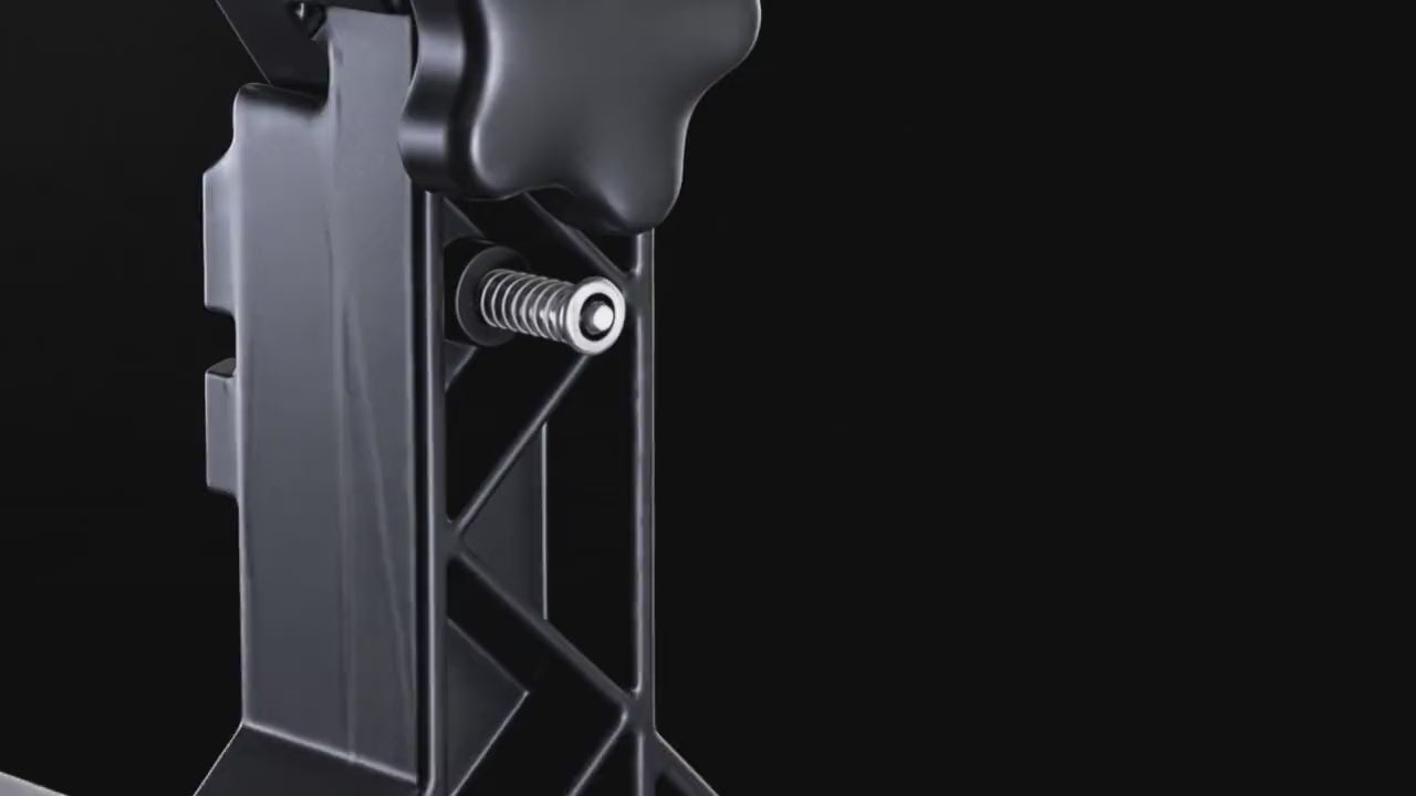 SCREEDBARS™ clamp gripping an aluminum straightedge, shown in close detail.